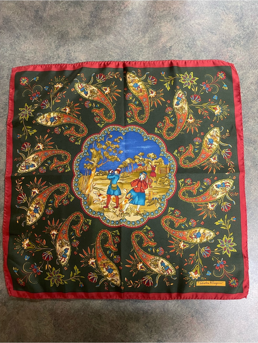 100% silk Salvadore Ferragamo Dark Green Paisley Scarf with Red Border.